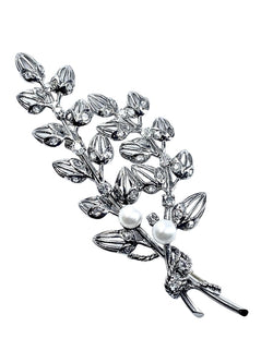 Broche en platine et or 18 carats, perles et diamants. - Castafiore