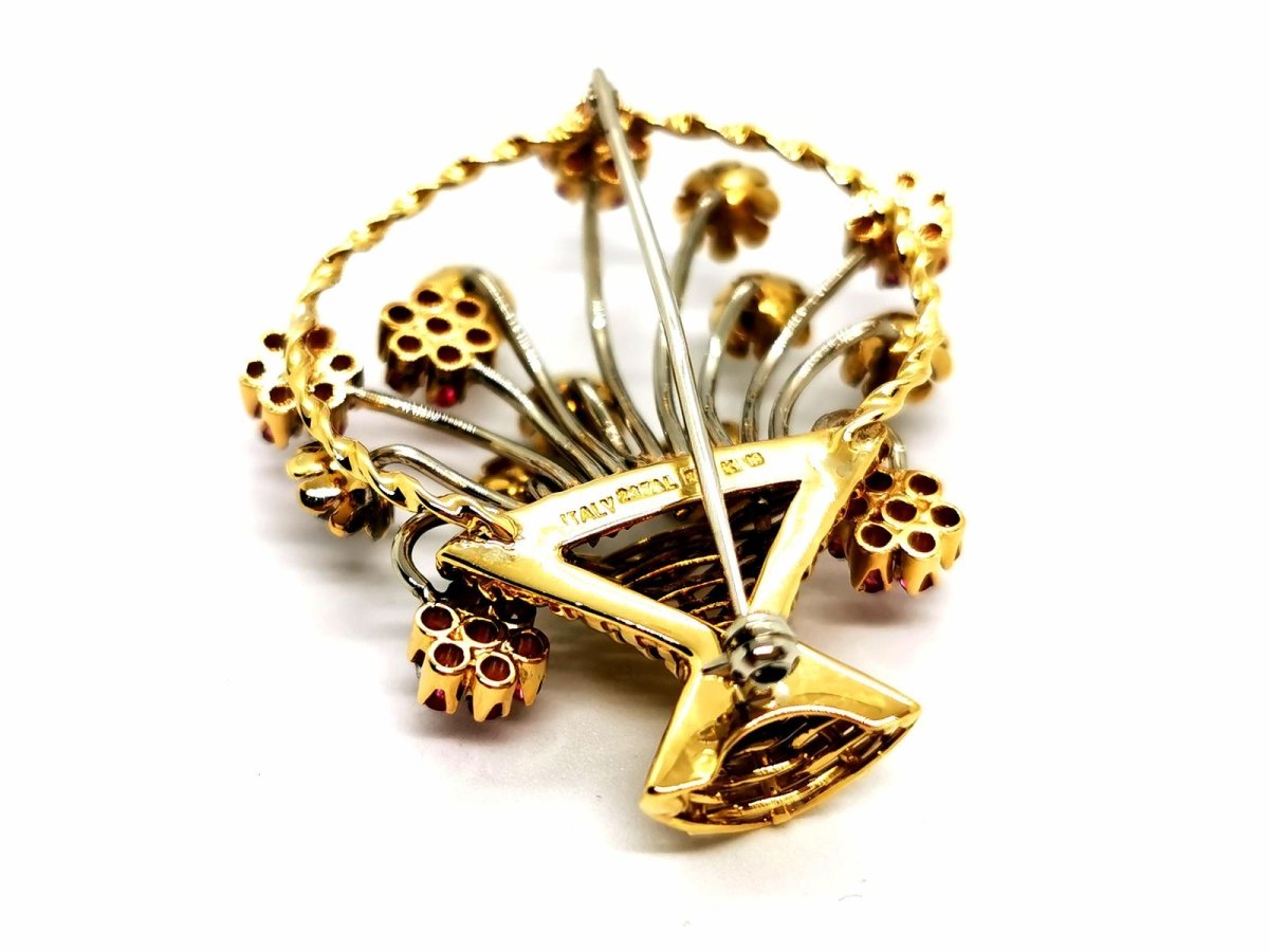 Broche fleur en 2 ors, diamants et rubis - Castafiore