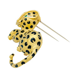 Broche Fred "Léopard" en or jaune, diamants, émail et émeraudes - Castafiore