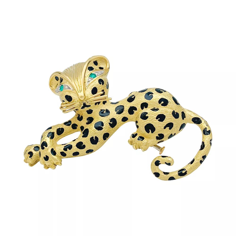 Broche Fred "Léopard" en or jaune, diamants, émail et émeraudes - Castafiore