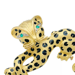 Broche Fred "Léopard" en or jaune, diamants, émail et émeraudes - Castafiore