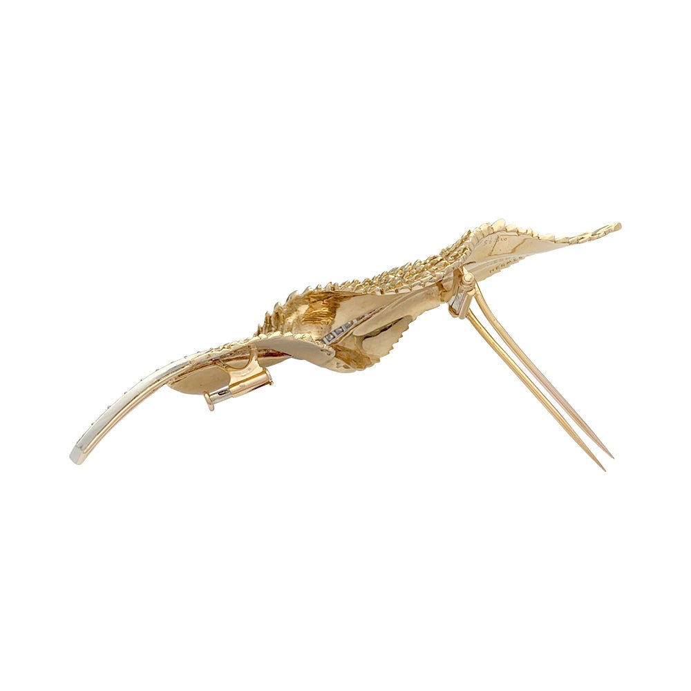 Broche HERMÈS "Plume" en or jaune, platine et diamants - Castafiore