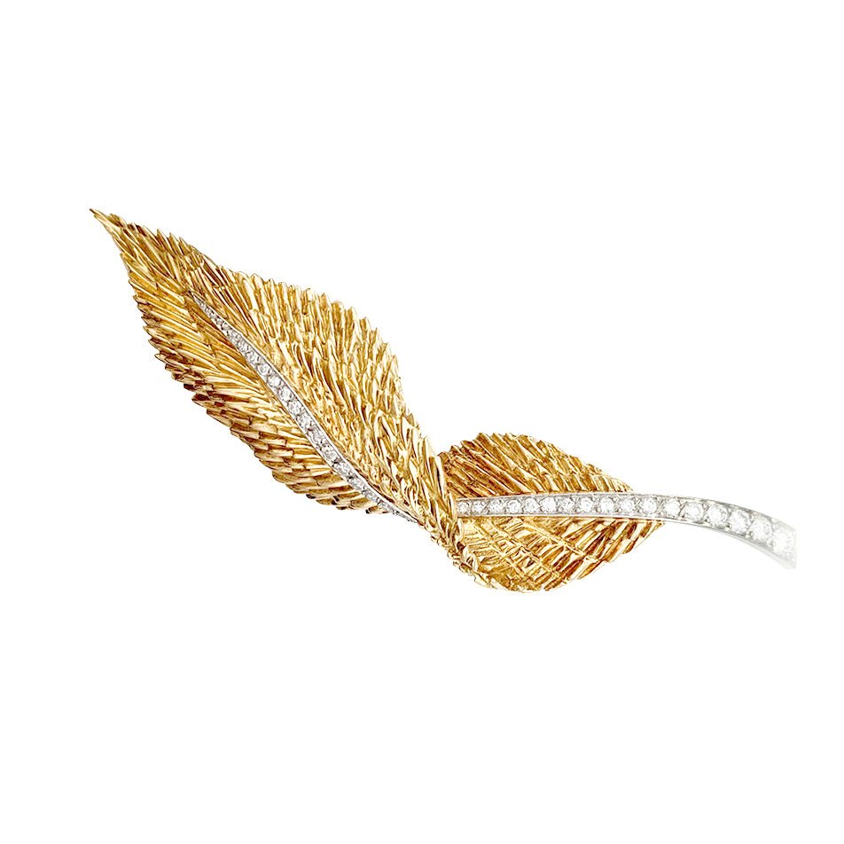 Broche HERMÈS "Plume" en or jaune, platine et diamants - Castafiore
