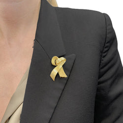 Broche Mauboussin vintage "Ruban", or jaune. - Castafiore