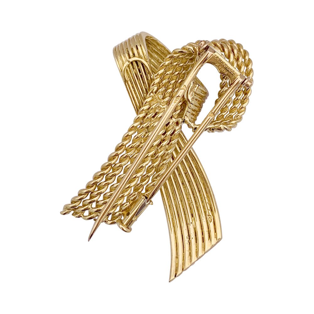 Broche Mauboussin vintage "Ruban", or jaune. - Castafiore
