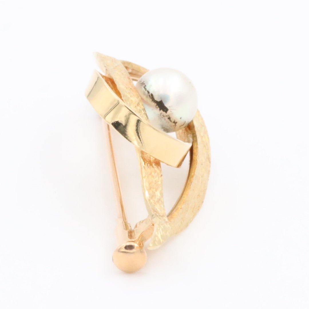 Broche or jaune et perle - Castafiore