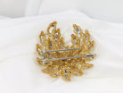 Broche vintage fleur en or et diamants dans le goût du modèle anémones de Van Cleef & Arpels - Castafiore
