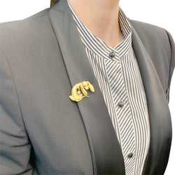 Broche vintage "Teckel", or jaune, diamants - Castafiore