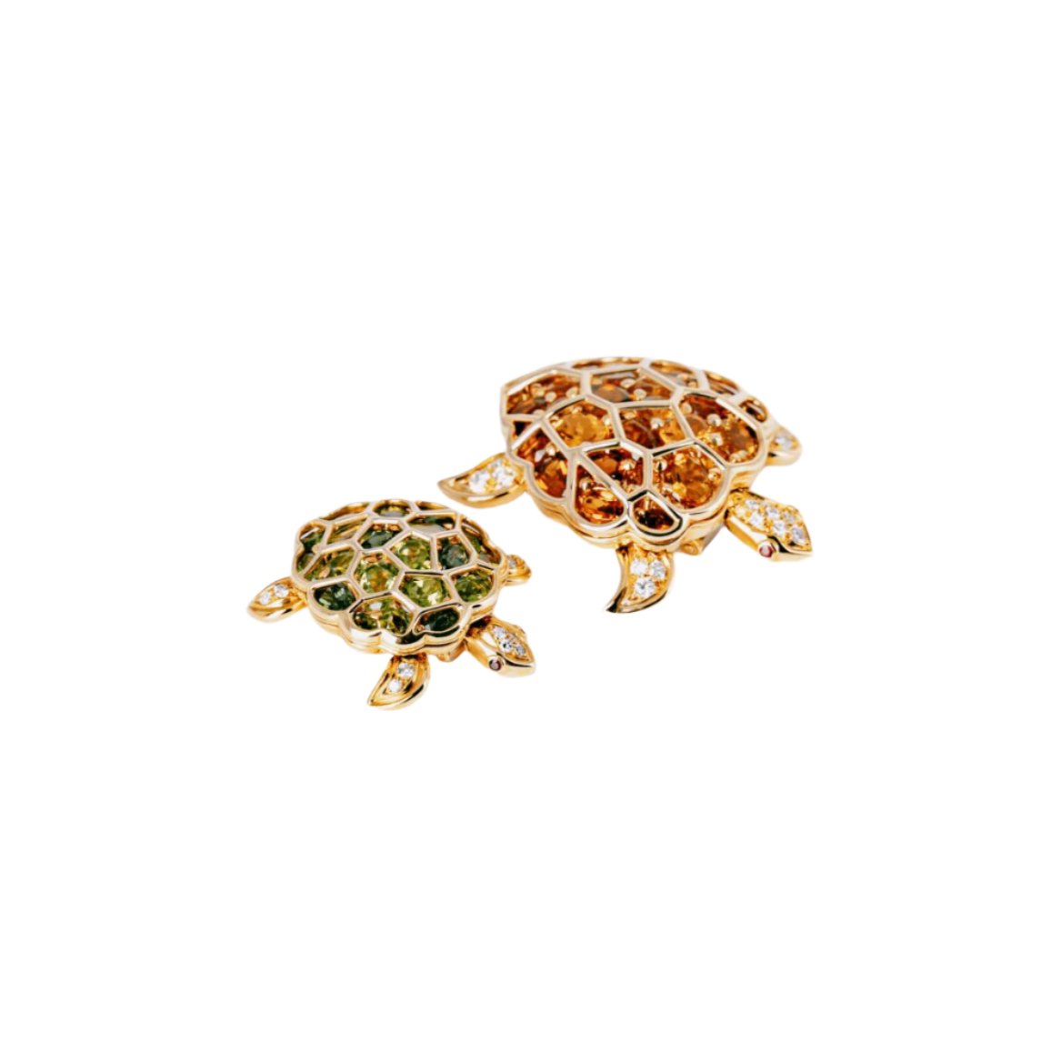 Broches CHANEL "Tortue" en or jaune, péridots, citrines et diamants - Castafiore