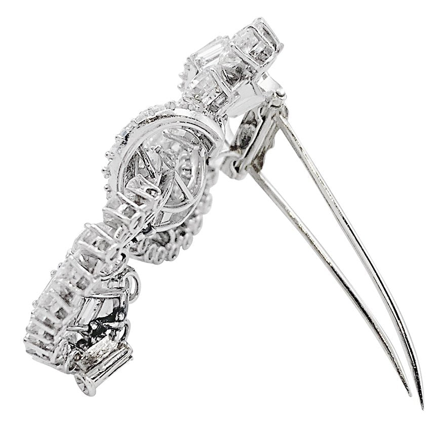 Clip J.Lacloche, "Volutes", platine, or blanc, diamants - Castafiore