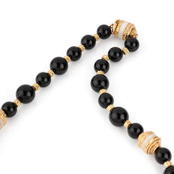 Collier BOUCHERON en or jaune, onyx et corail - Castafiore
