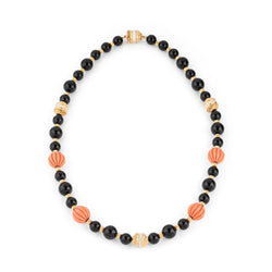 Collier BOUCHERON en or jaune, onyx et corail - Castafiore