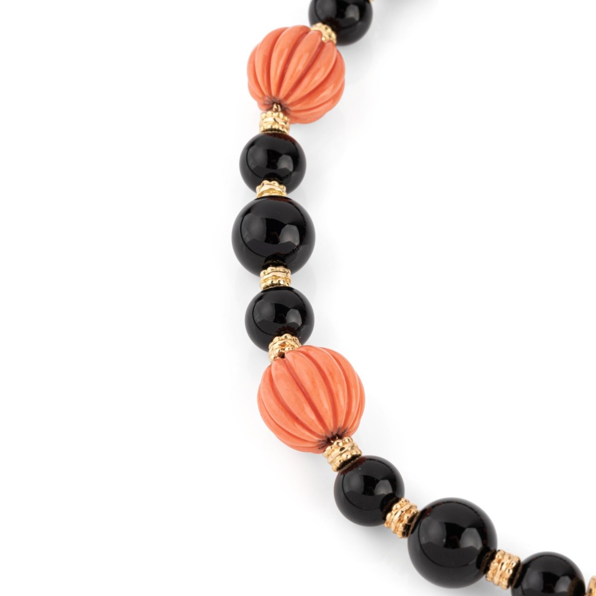 Collier BOUCHERON en or jaune, onyx et corail - Castafiore