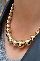 Collier boules en or jaune - Castafiore