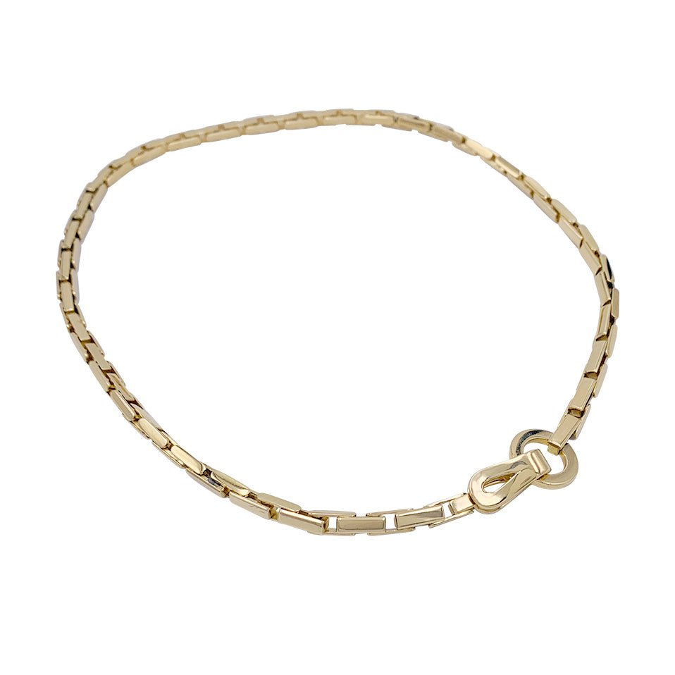 Collier CARTIER "Agrafe" en or jaune - Castafiore