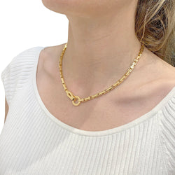 Collier CARTIER "Agrafe" en or jaune - Castafiore