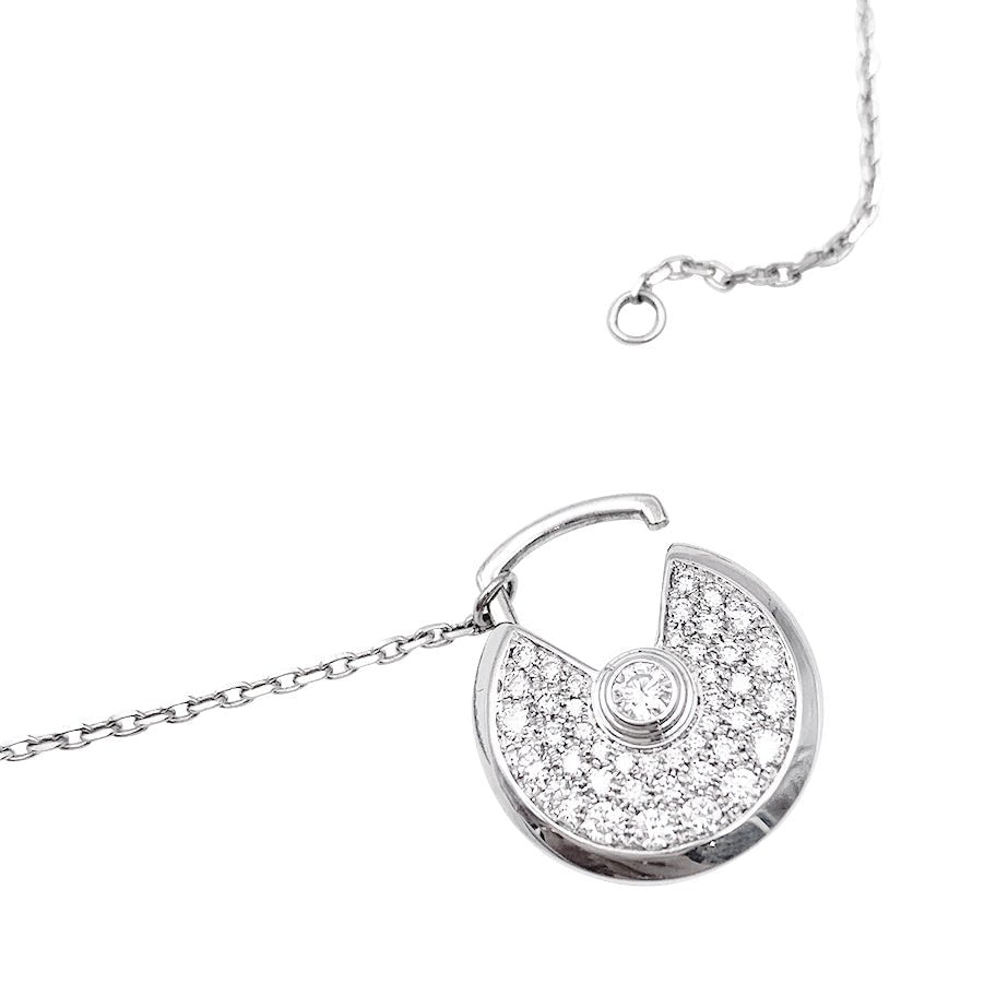Collier Cartier, "Amulette", or blanc, diamants. - Castafiore