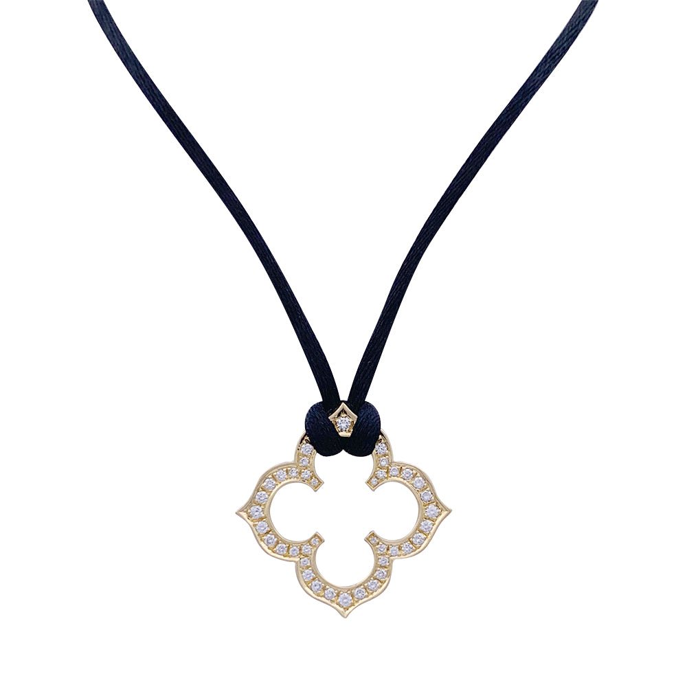 Collier CARTIER "Trèfle Gothique"en or jaune et diamants. - Castafiore
