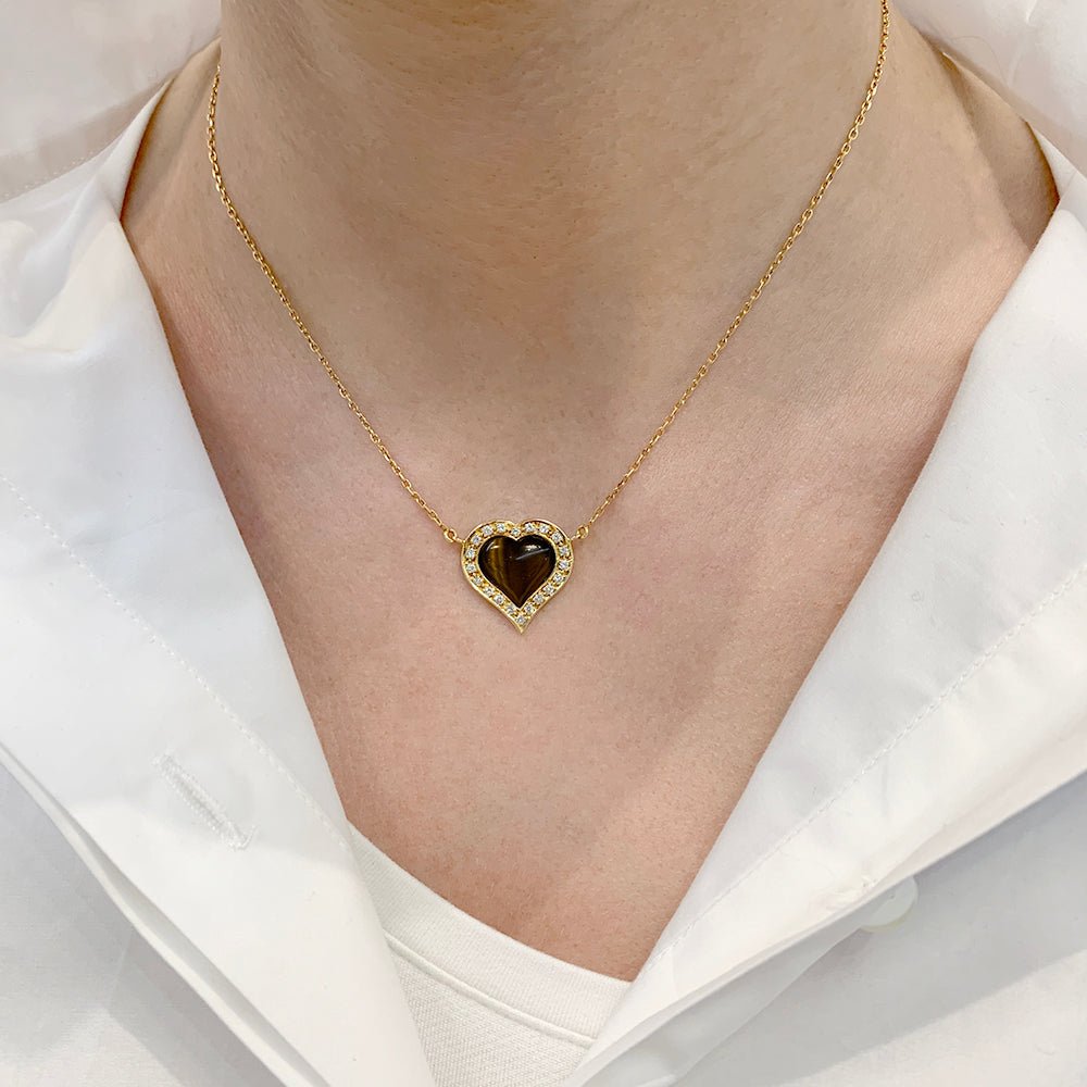 Collier, "Coeur", or jaune, oeil de tigre, diamants - Castafiore