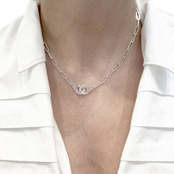 Collier Dinh Van, "Menottes R12", or blanc. - Castafiore