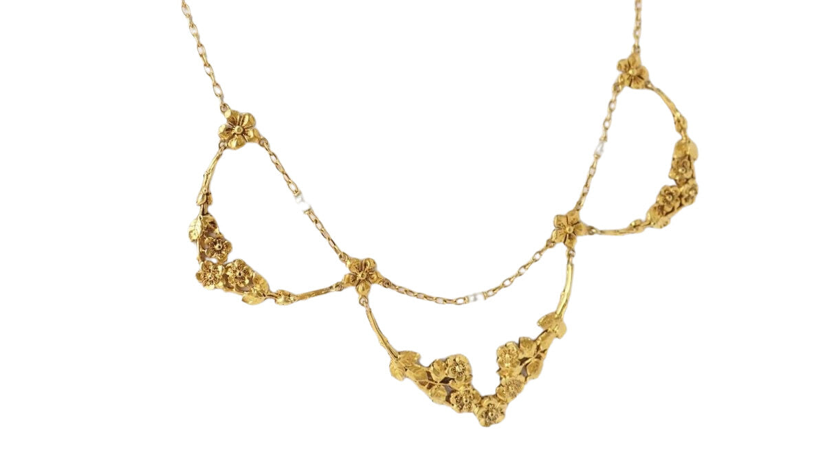 Collier draperie début XIXème siècle en or jaune et perles - Castafiore