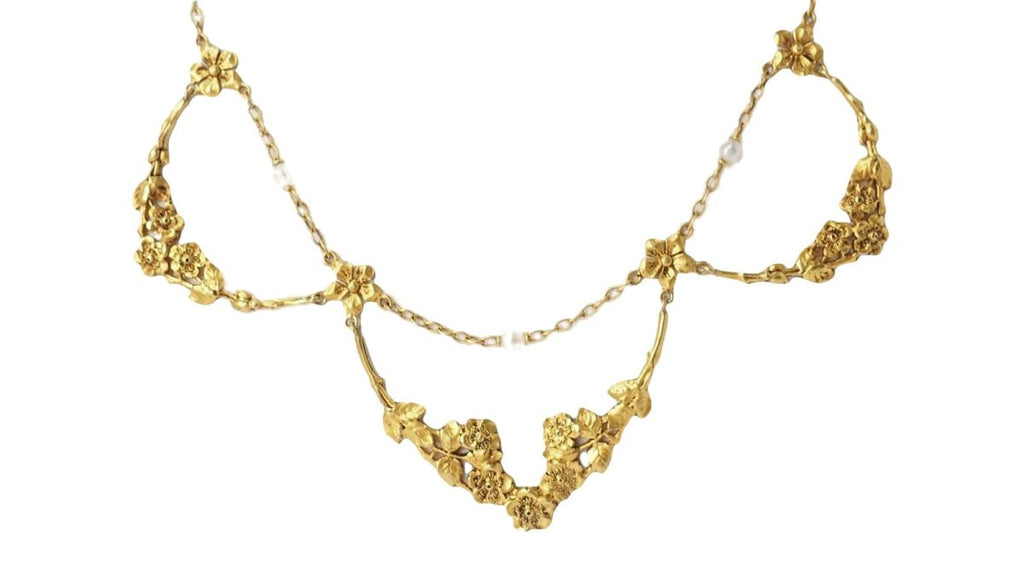 Collier draperie début XIXème siècle en or jaune et perles - Castafiore