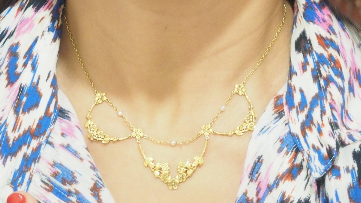 Collier draperie début XIXème siècle en or jaune et perles - Castafiore
