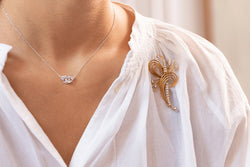 Collier en or blanc 18 carats modèle Menottes R8, DINH VAN - Castafiore