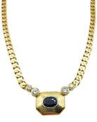 Collier en or jaune, motif central avec un saphir cabochon et des diamants - Castafiore