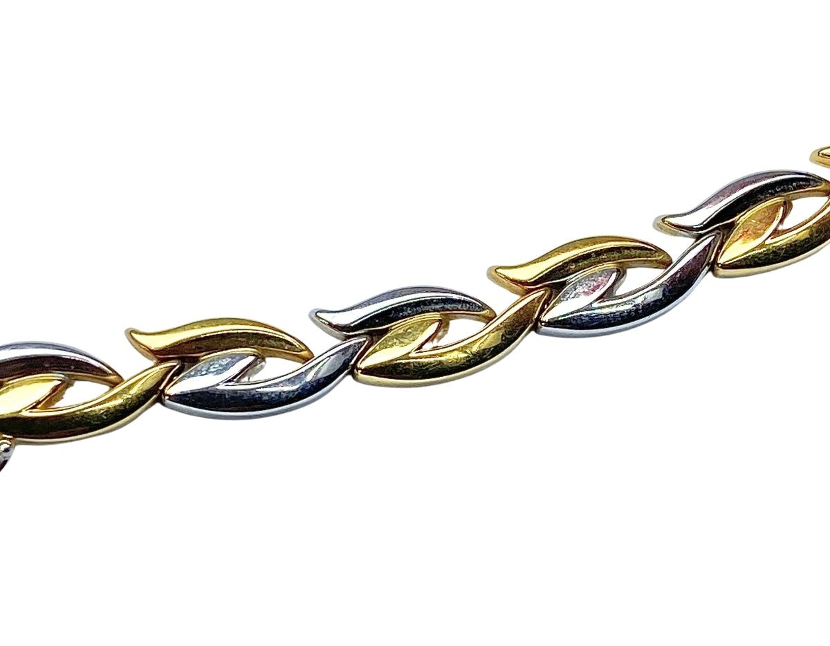 Collier et bracelet en or jaune et blanc 18 carats formant parure - Castafiore