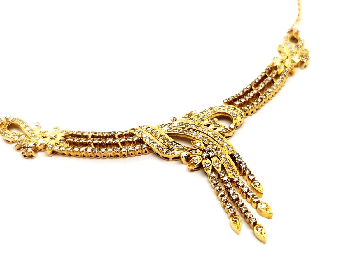 Collier fleurs en or jaune et diamants - Castafiore