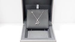 Collier Messika "Snake" en or blanc et diamants - Castafiore