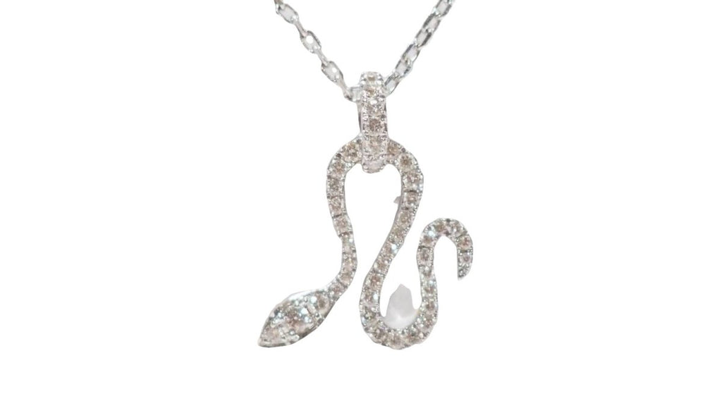 Collier Messika "Snake" en or blanc et diamants - Castafiore