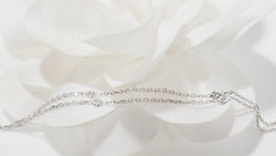 Collier Messika "Snake" en or blanc et diamants - Castafiore
