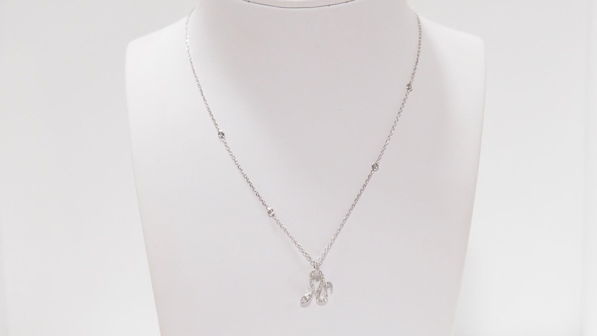 Collier Messika "Snake" en or blanc et diamants - Castafiore