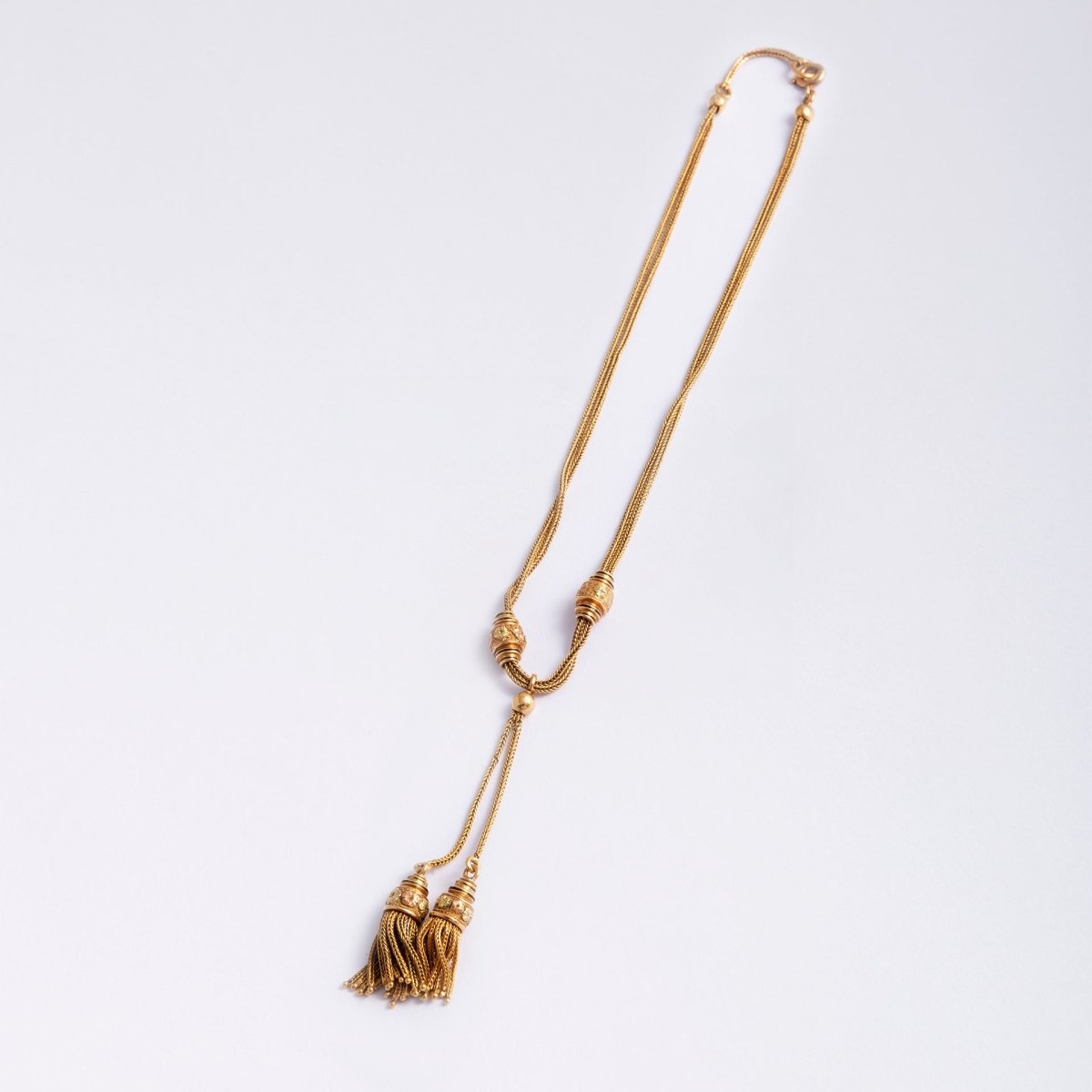 Collier Négligé à pompons en or jaune et émail noir - Castafiore