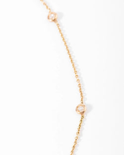 Collier or jaune intercalé de 9 diamants sur maille forçat en sertis clos. - Castafiore