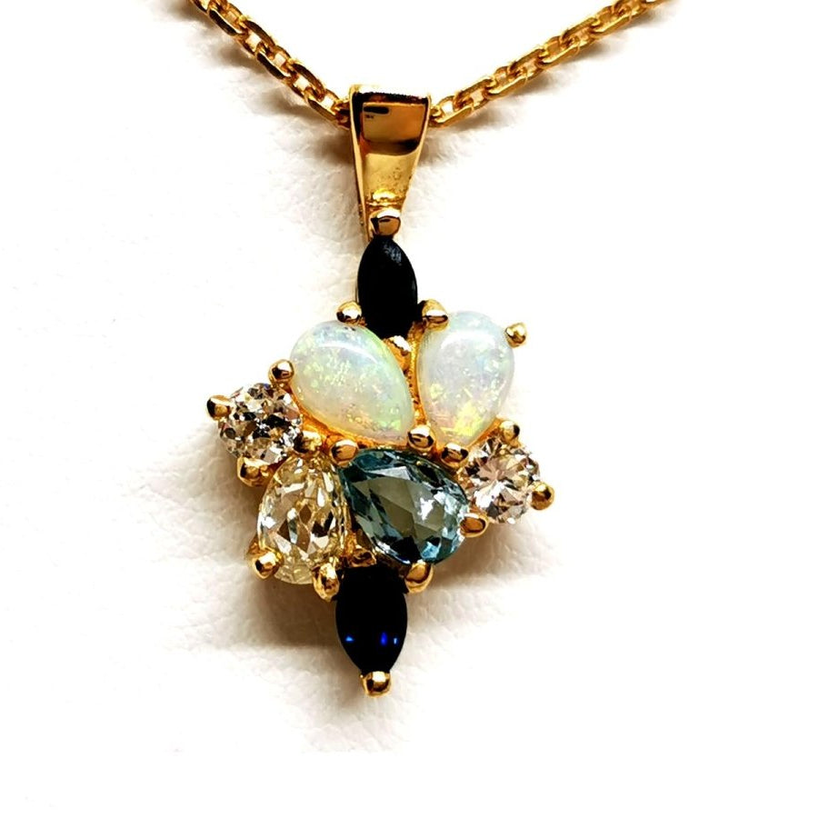 Collier Pendentif en or jaune, diamants, opales, aigue-marine et saphirs - Castafiore