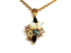 Collier Pendentif en or jaune, diamants, opales, aigue-marine et saphirs - Castafiore