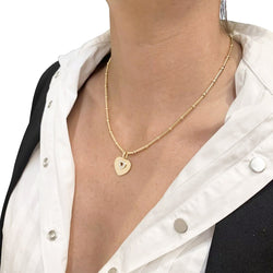 Collier Poiray "Coeur Secret" en or jaune, diamants - Castafiore