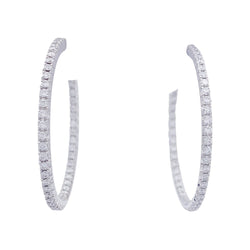 Créoles TIFFANY & CO, "Métro" en or blanc et diamant. - Castafiore