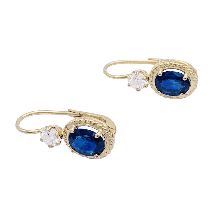 Dormeuses or jaune, saphirs et diamants. - Castafiore
