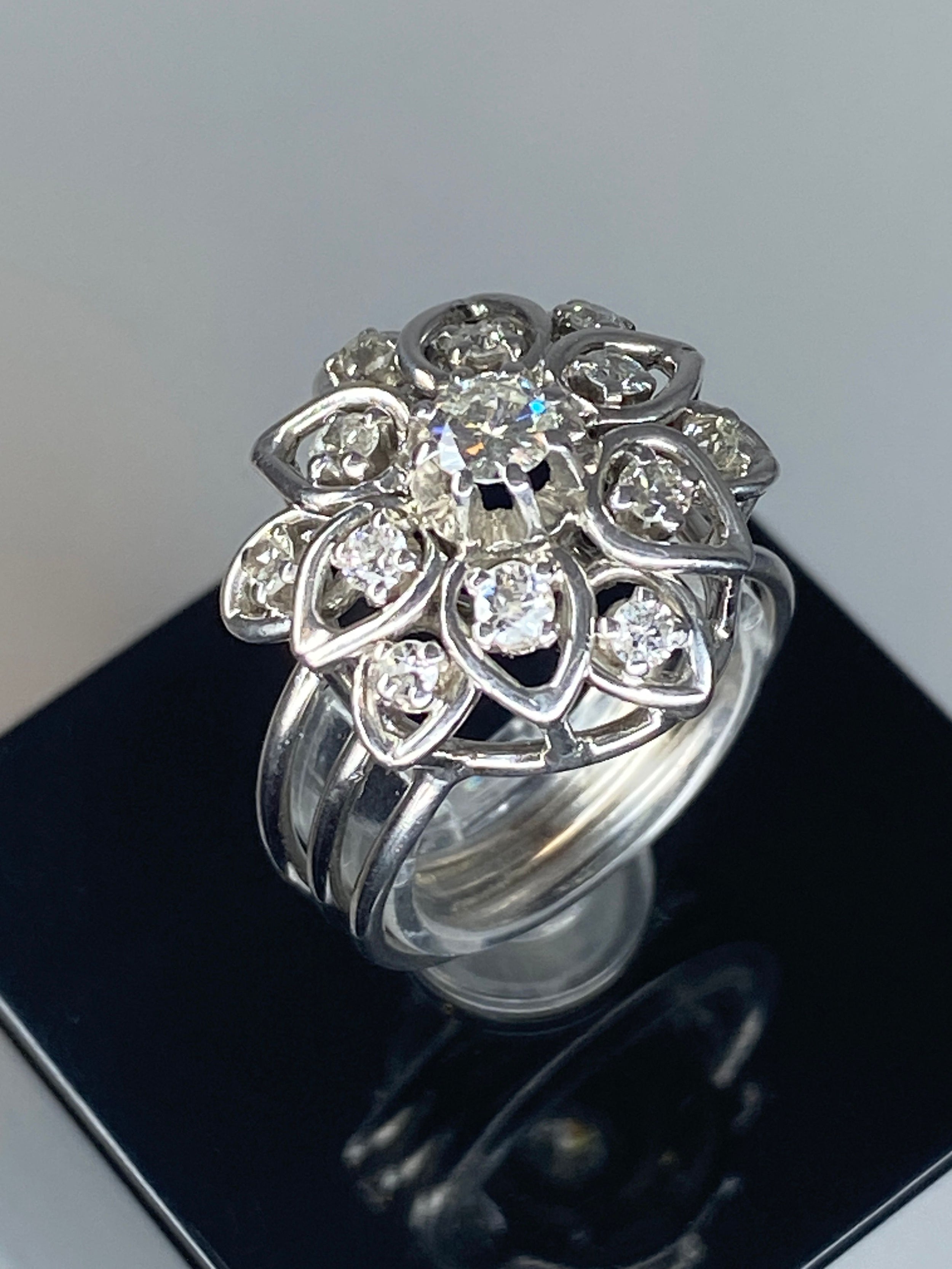Platinum daisy ring set with diamonds