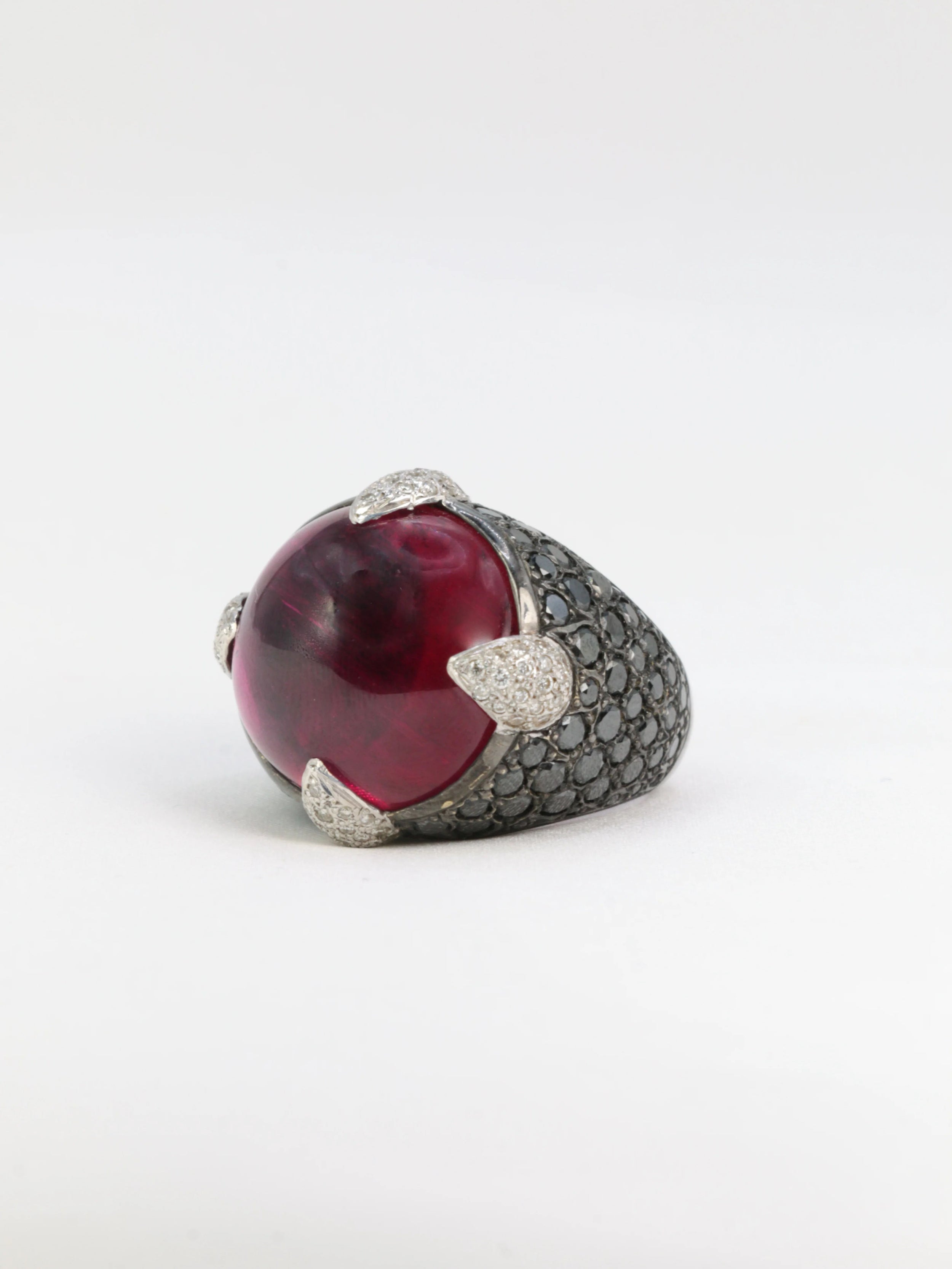 Vintage ball ring in black gold, pink tourmaline and black and white diamonds