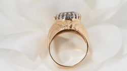 Yellow gold and blue topaz ring 