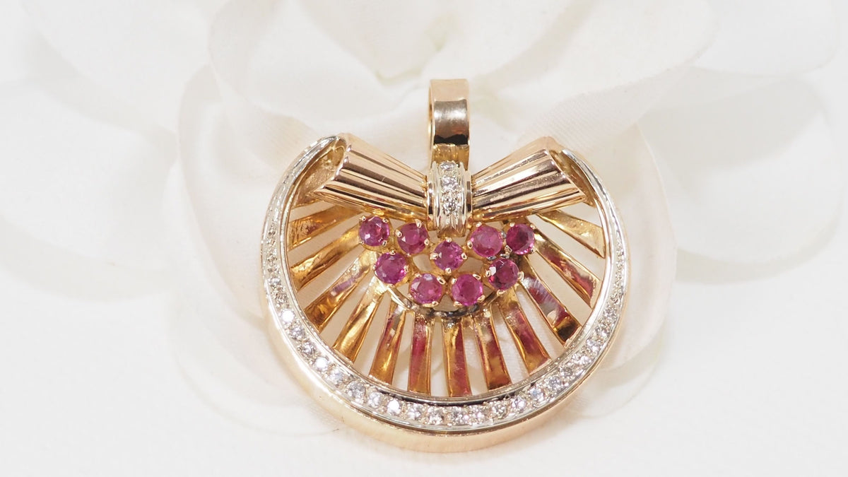 Pendant in yellow gold, rubies and diamonds 