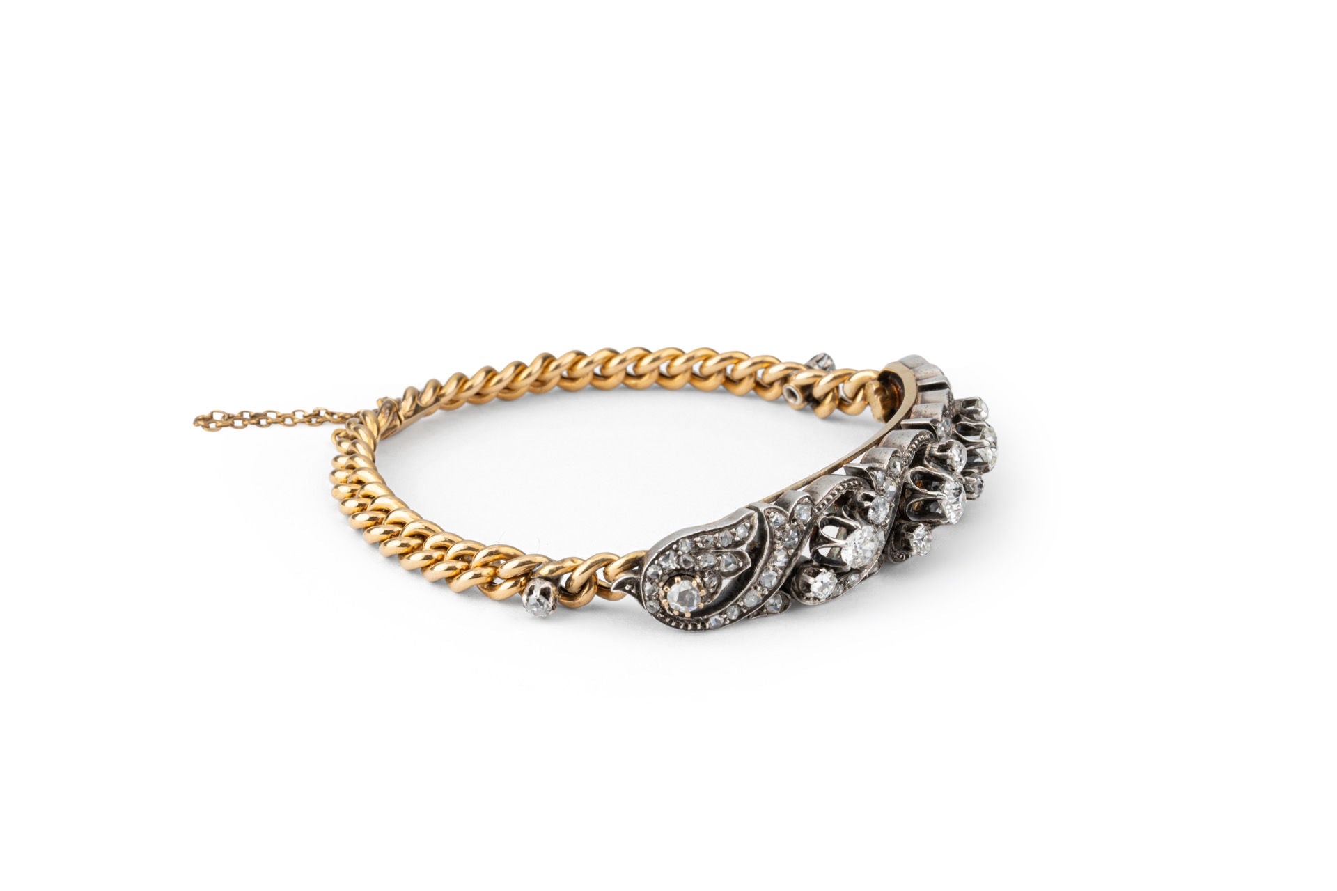 Curb bracelet in yellow gold, silver and diamonds