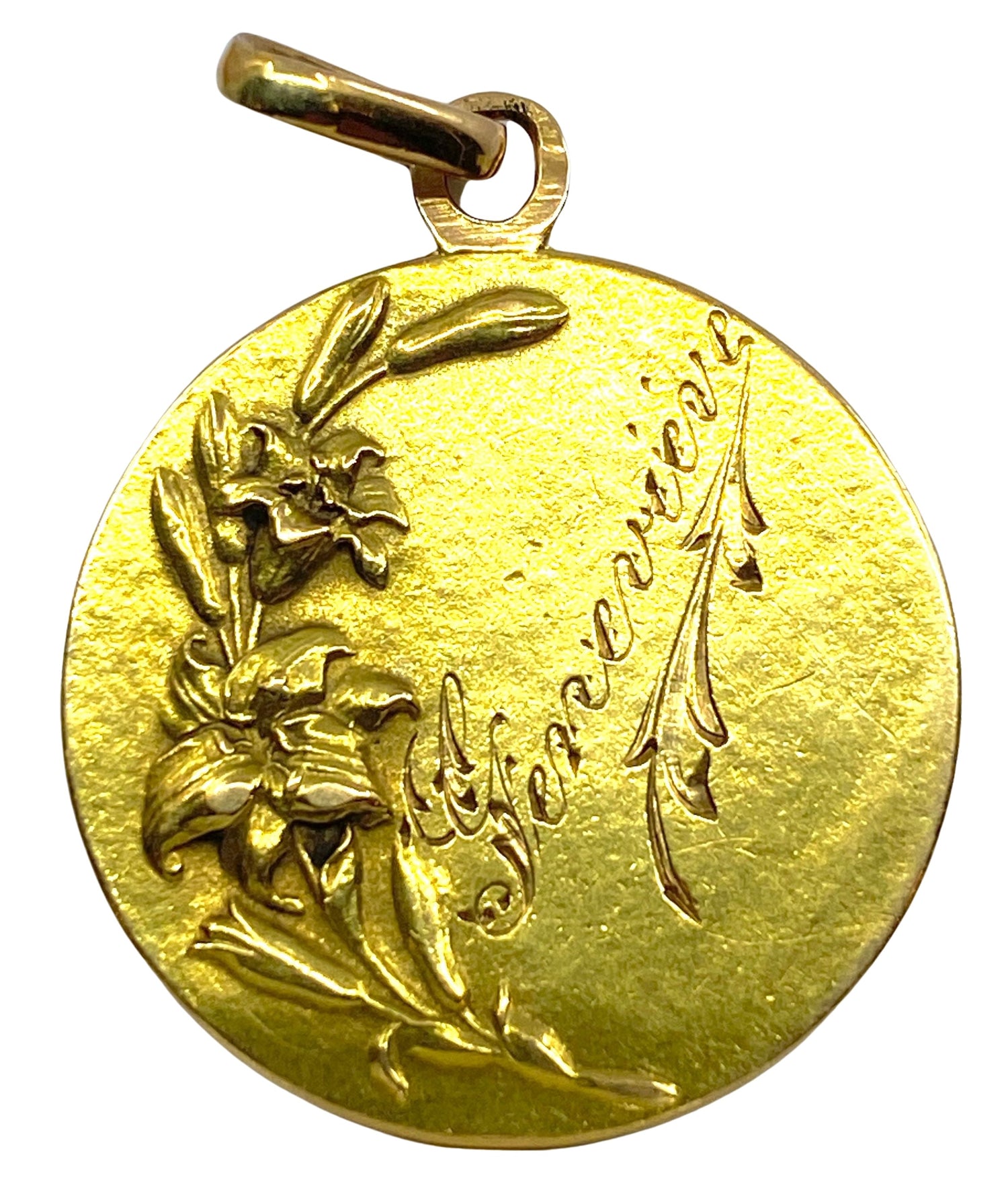 Médaille en or 18 carats représentant une sainte en prière