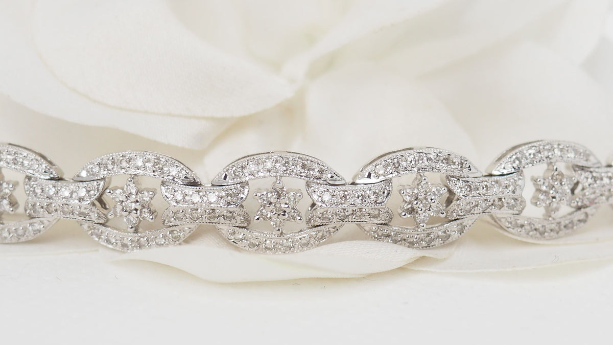 Openwork bracelet in white gold and diamonds 