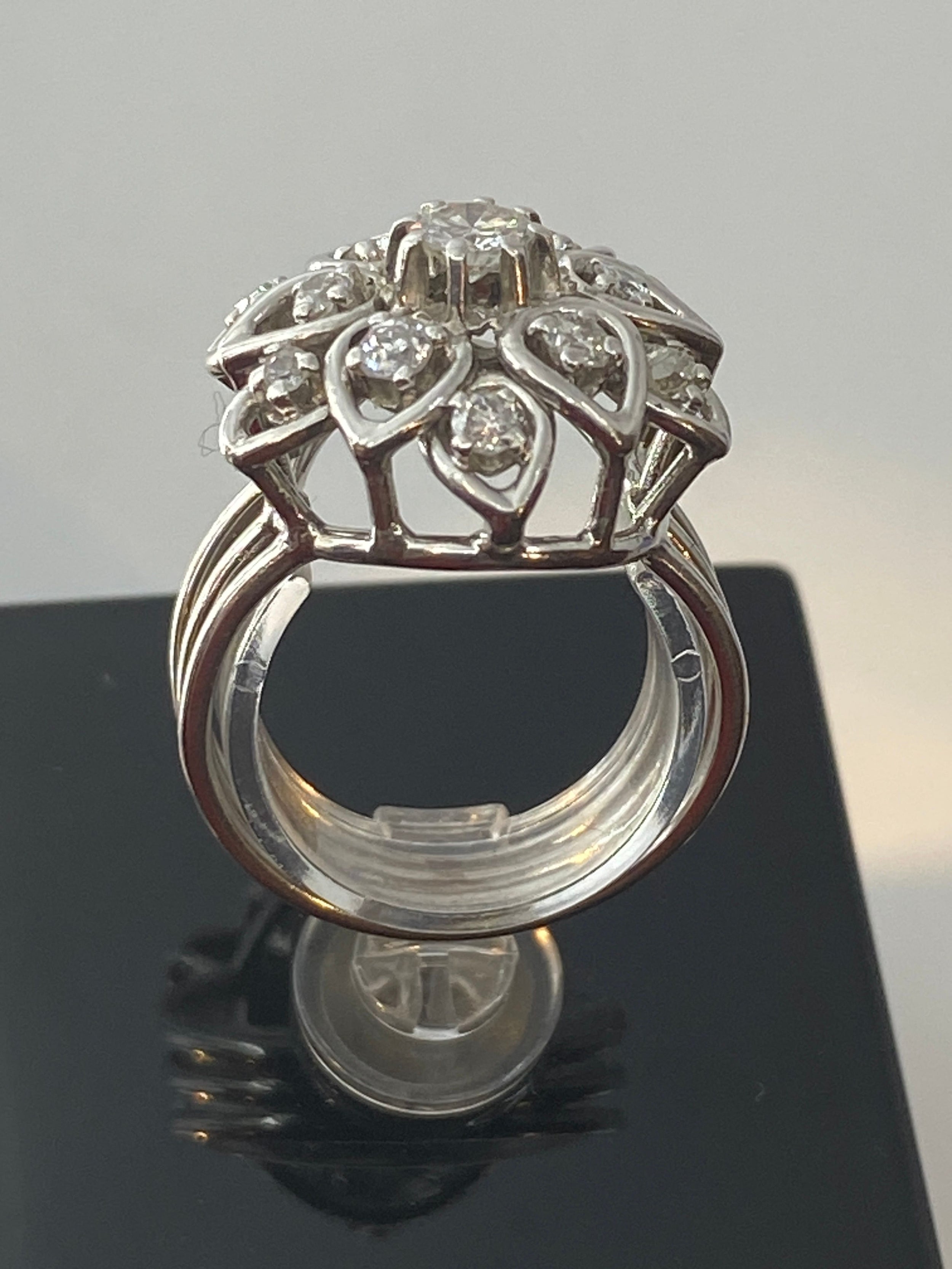 Platinum daisy ring set with diamonds